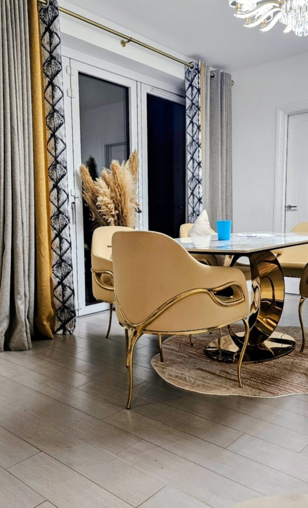 Designer-look dining chairs in a modern dining room.