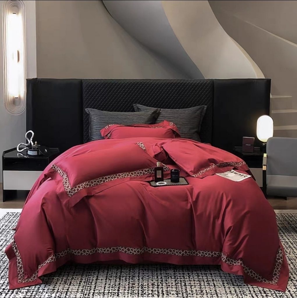 Luxury red bedding set with geometric trim from Verlin Studio